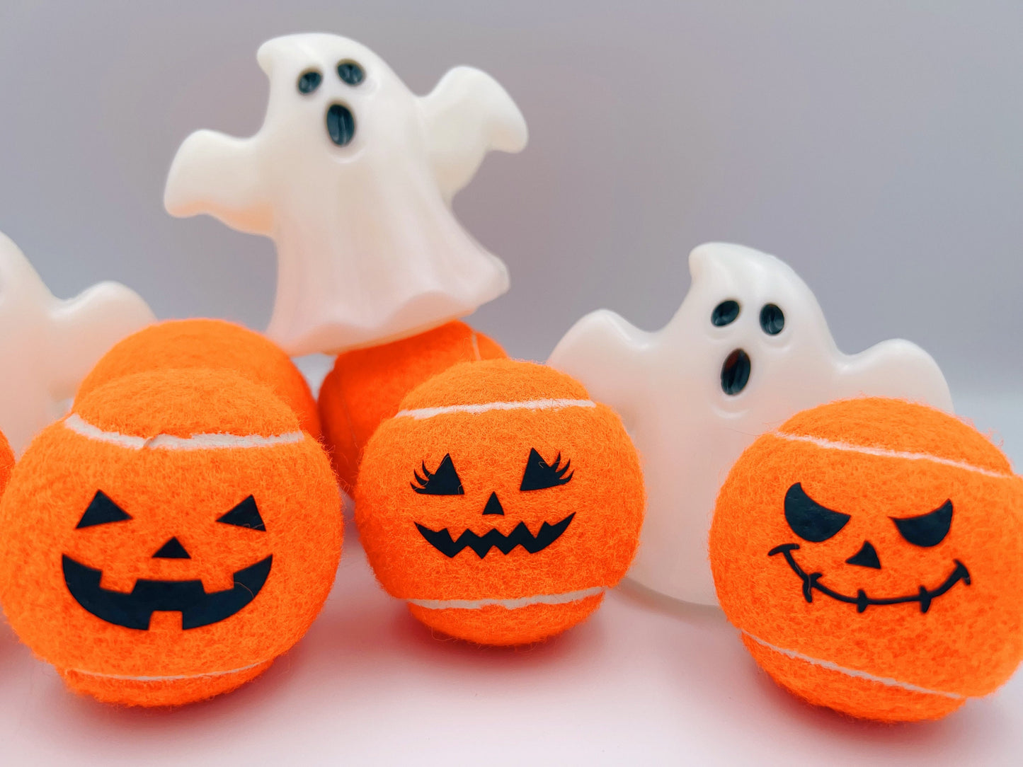 Three Haunted Halloween Tennis Balls